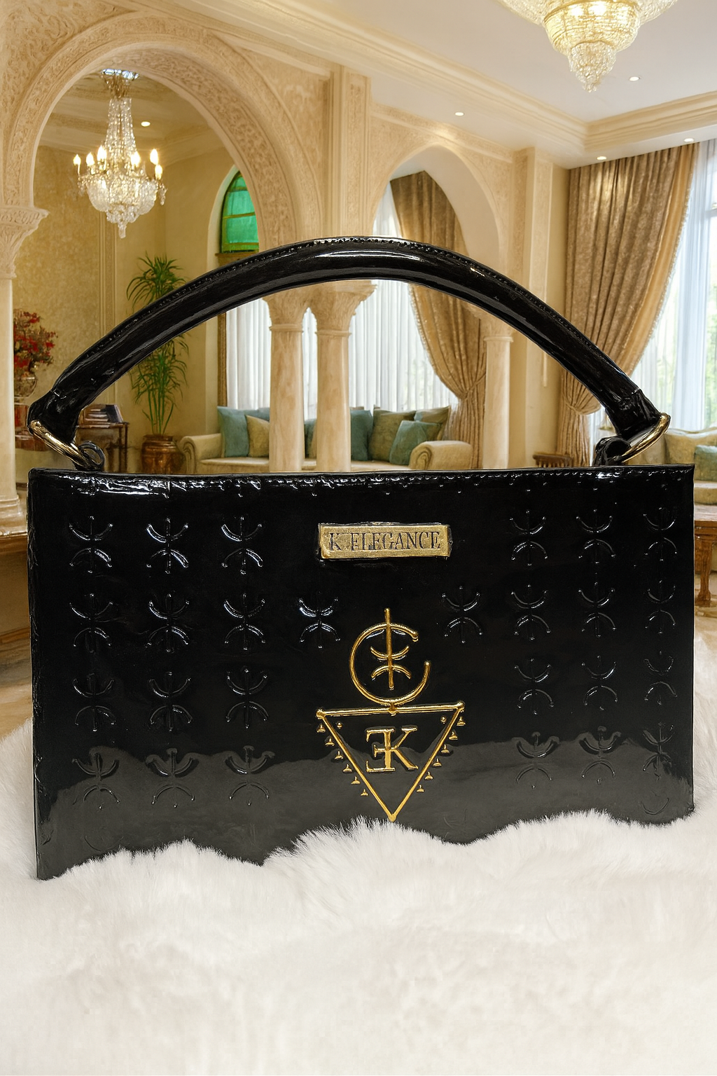 Luxurious black Sac TASSEDA handbag in premium recycled leather with golden 3D K.ELEGANCE logo and Amazigh embossed design.